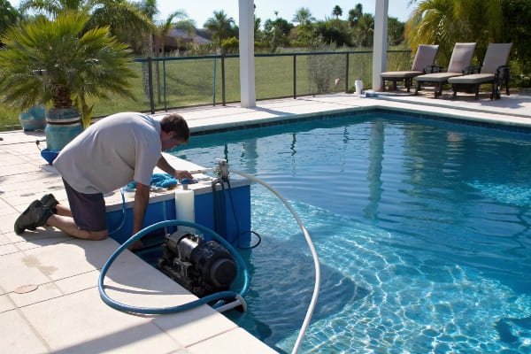 Pool pump circulating after shocking a pool pump system running at night with lights on